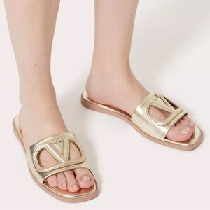 VALENTINO GARAVANI ESCAPE SLIDE SANDAL IN GOLD